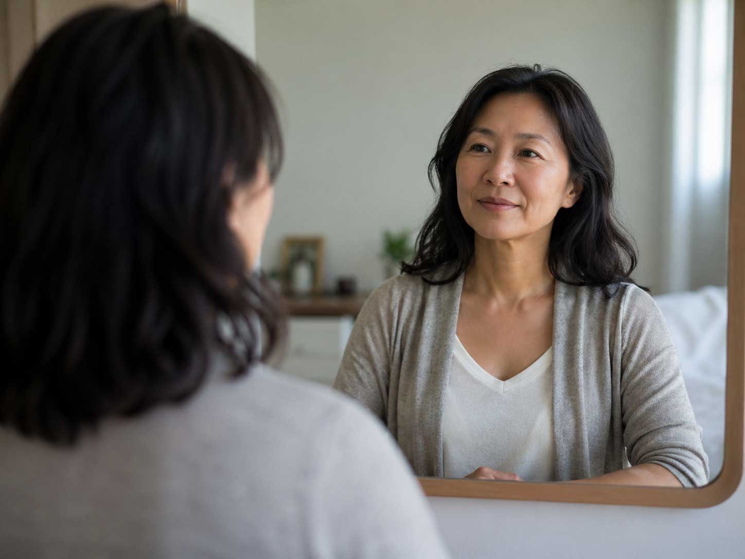 Is EMDR therapy right for me - woman looking n mirror