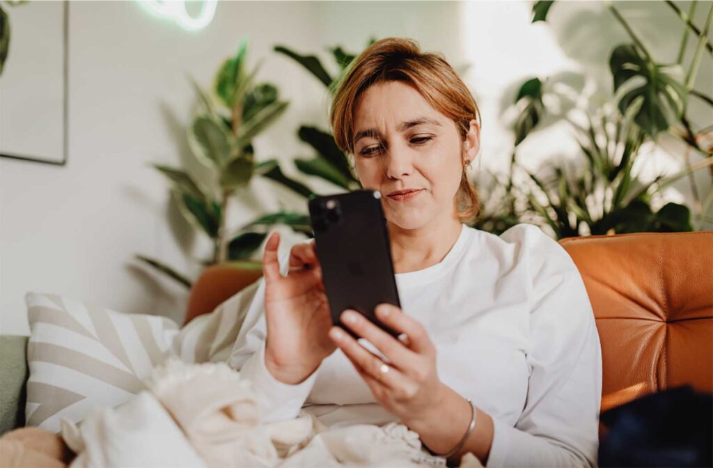 woman on cell phone avoiding conflict